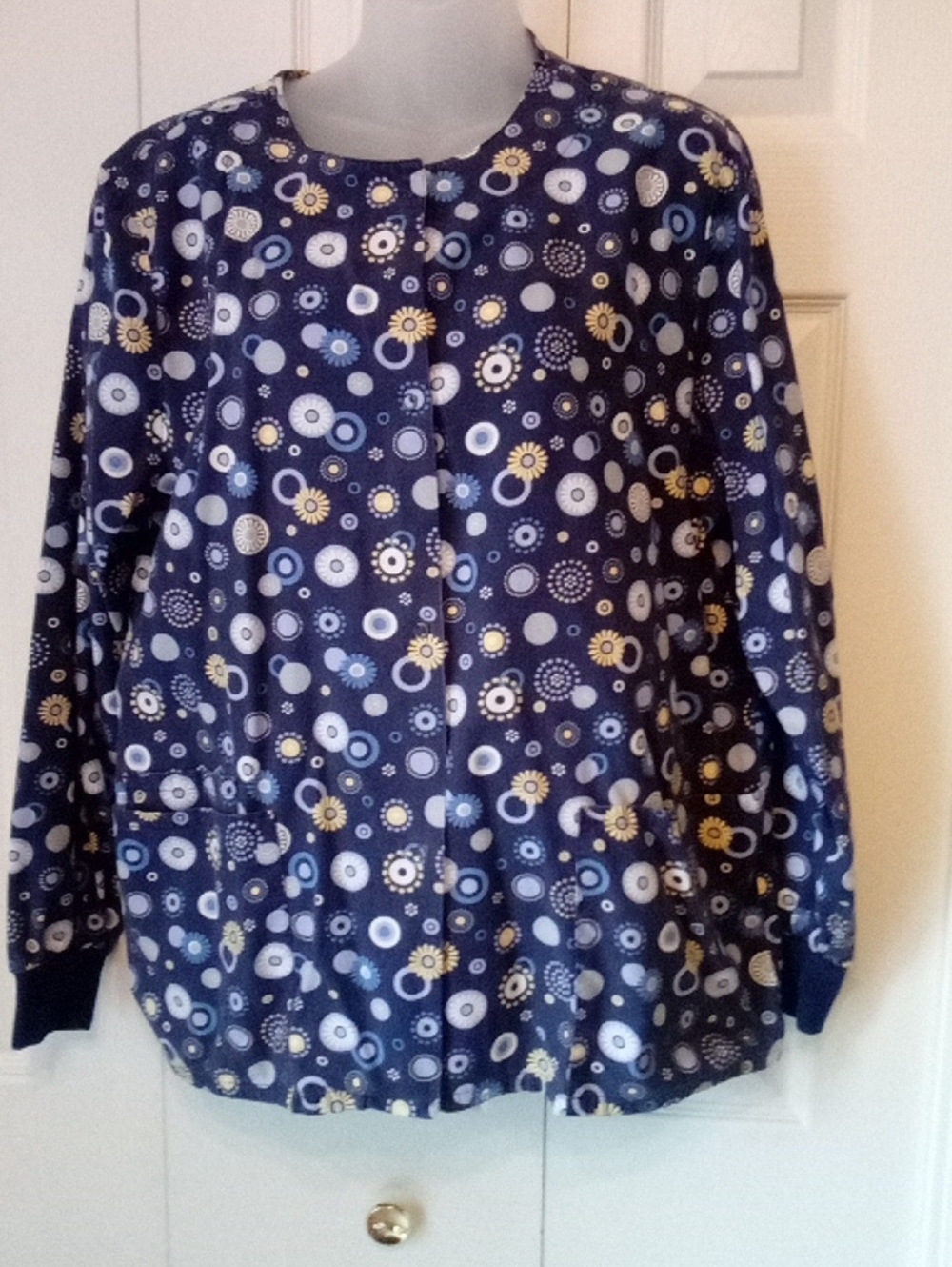 Women's Navy Patterned Snap-Front Scrub Jacket with Yellow & Light Blue Accents